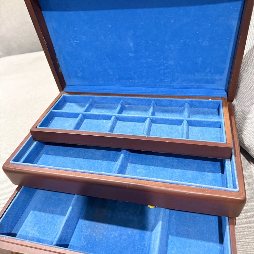 Elegant Brown Jewelry Box with Blue Interior